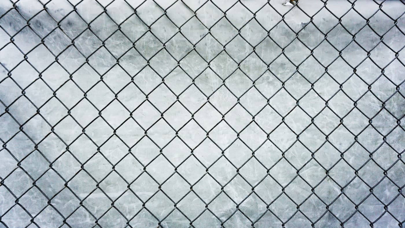 Metal chain-link fencing mesh